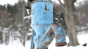 An old blue well